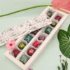 Bombones de chocolate fino y de aroma con detalles florales para regalar a novias, mujeres o mamá